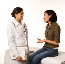 Doctor communicating with patient Doctor communicating with patient