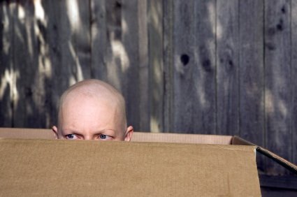 Cancer patient in a box. Cancer patient in a box.